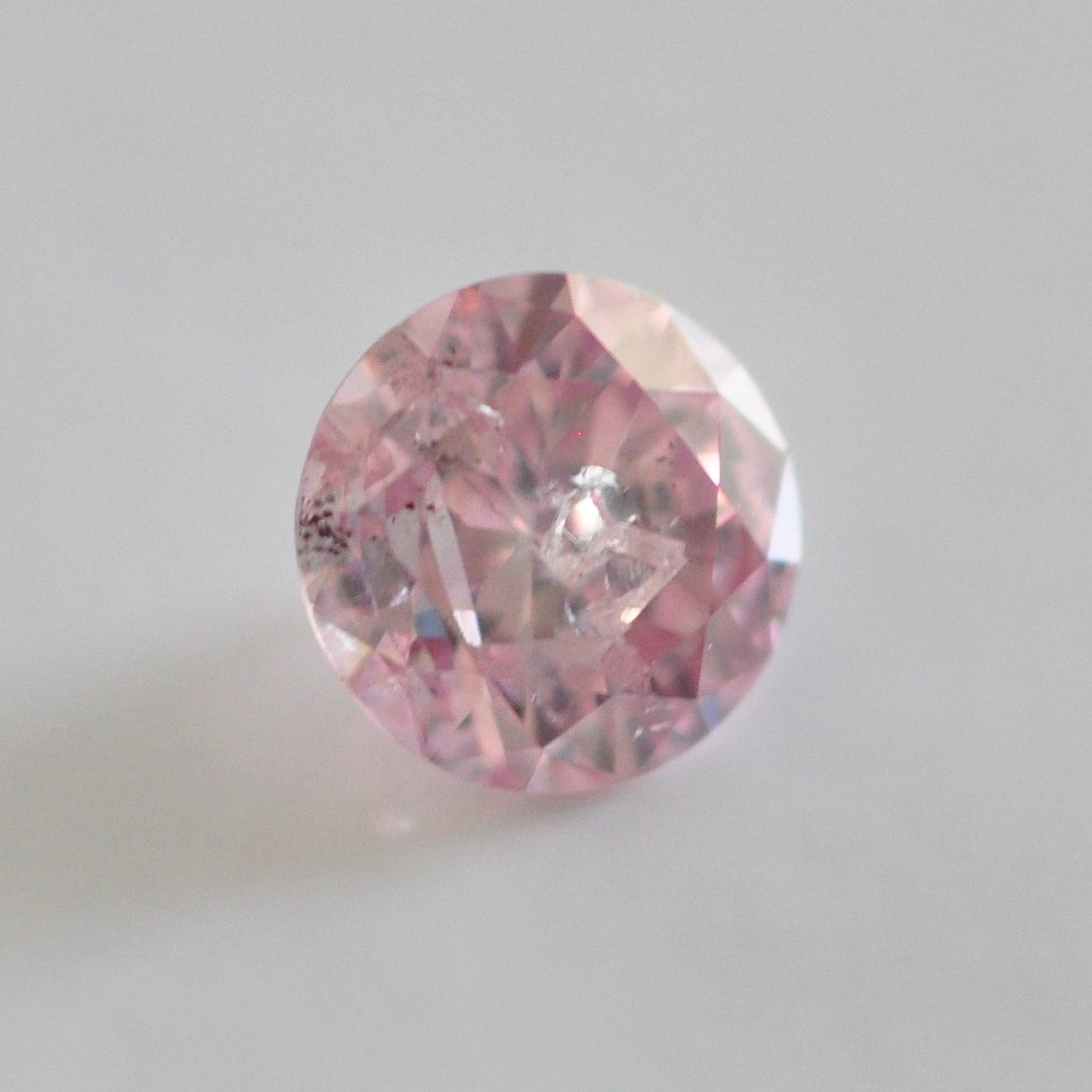 Fancy Purplish Pink 0.19 ct.