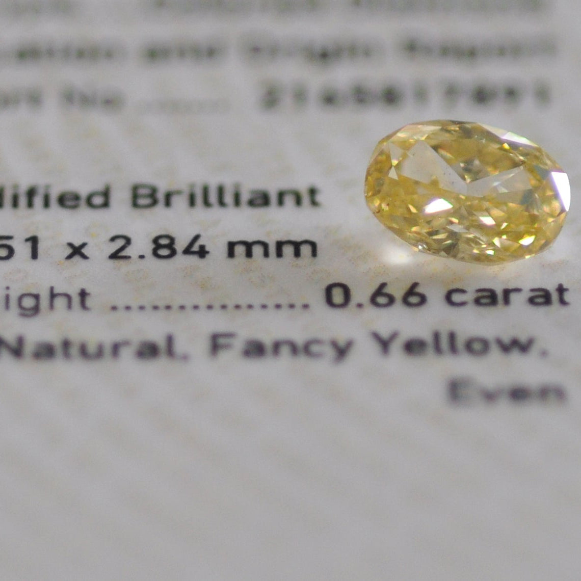 Fancy Yellow 0.66 ct.