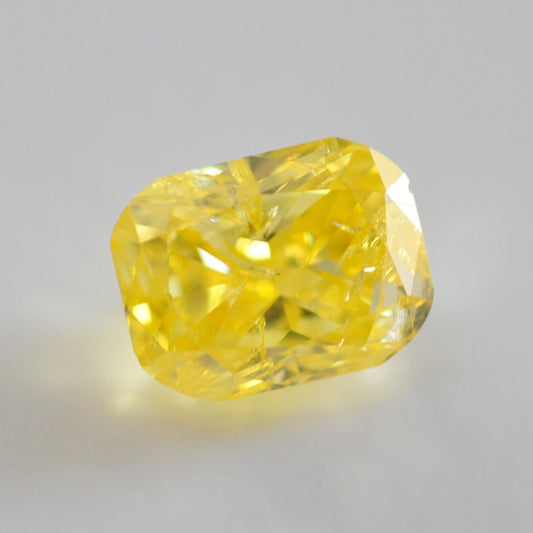 Fancy Vivid Yellow 0.88 ct.