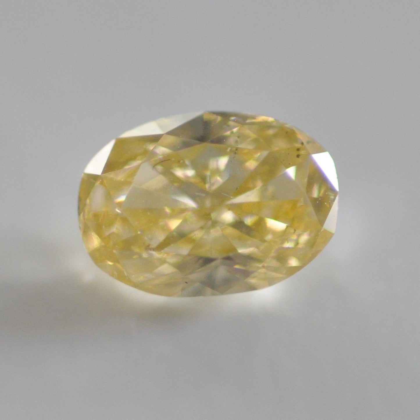 Fancy Yellow 0.66 ct.