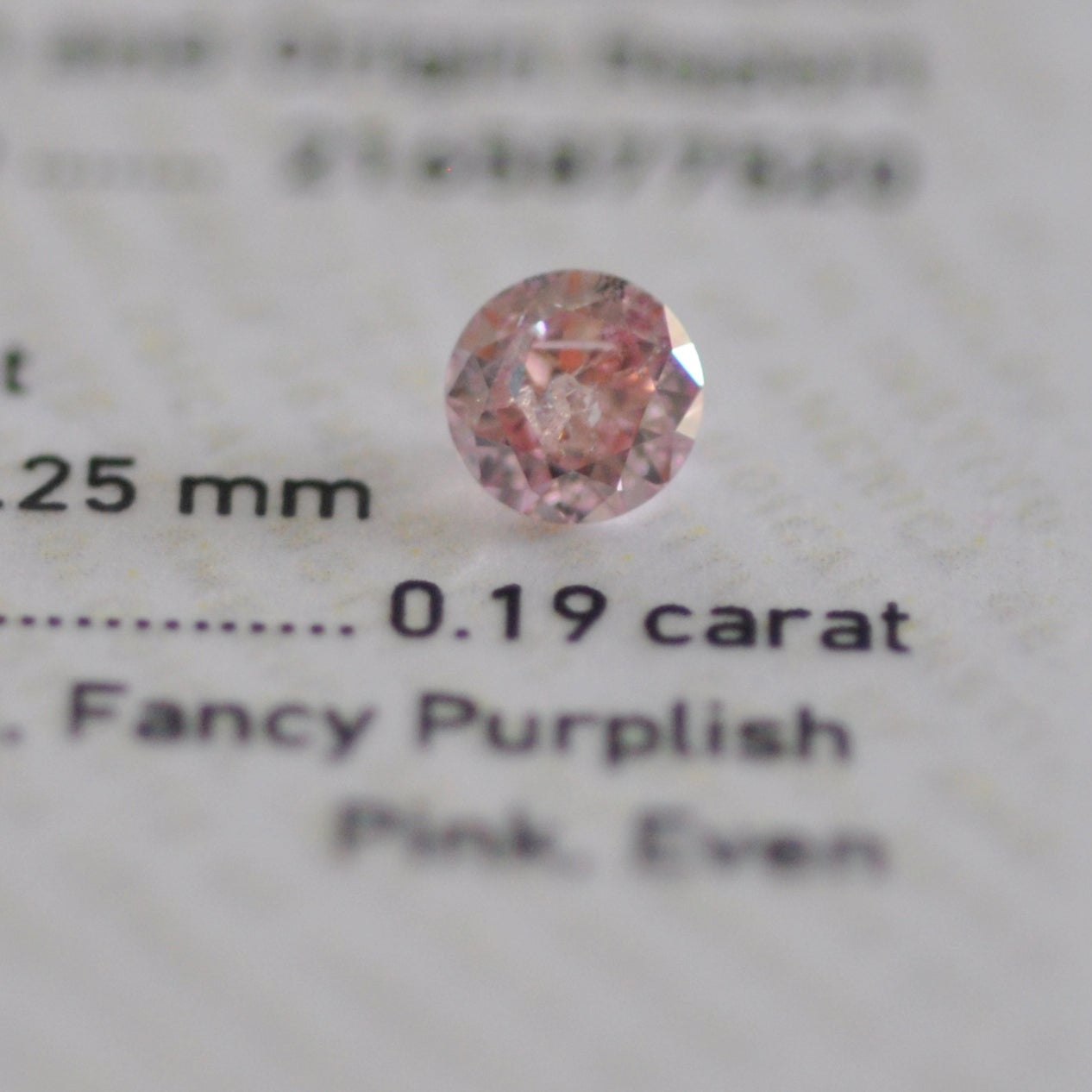 Fancy Purplish Pink 0.19 ct.