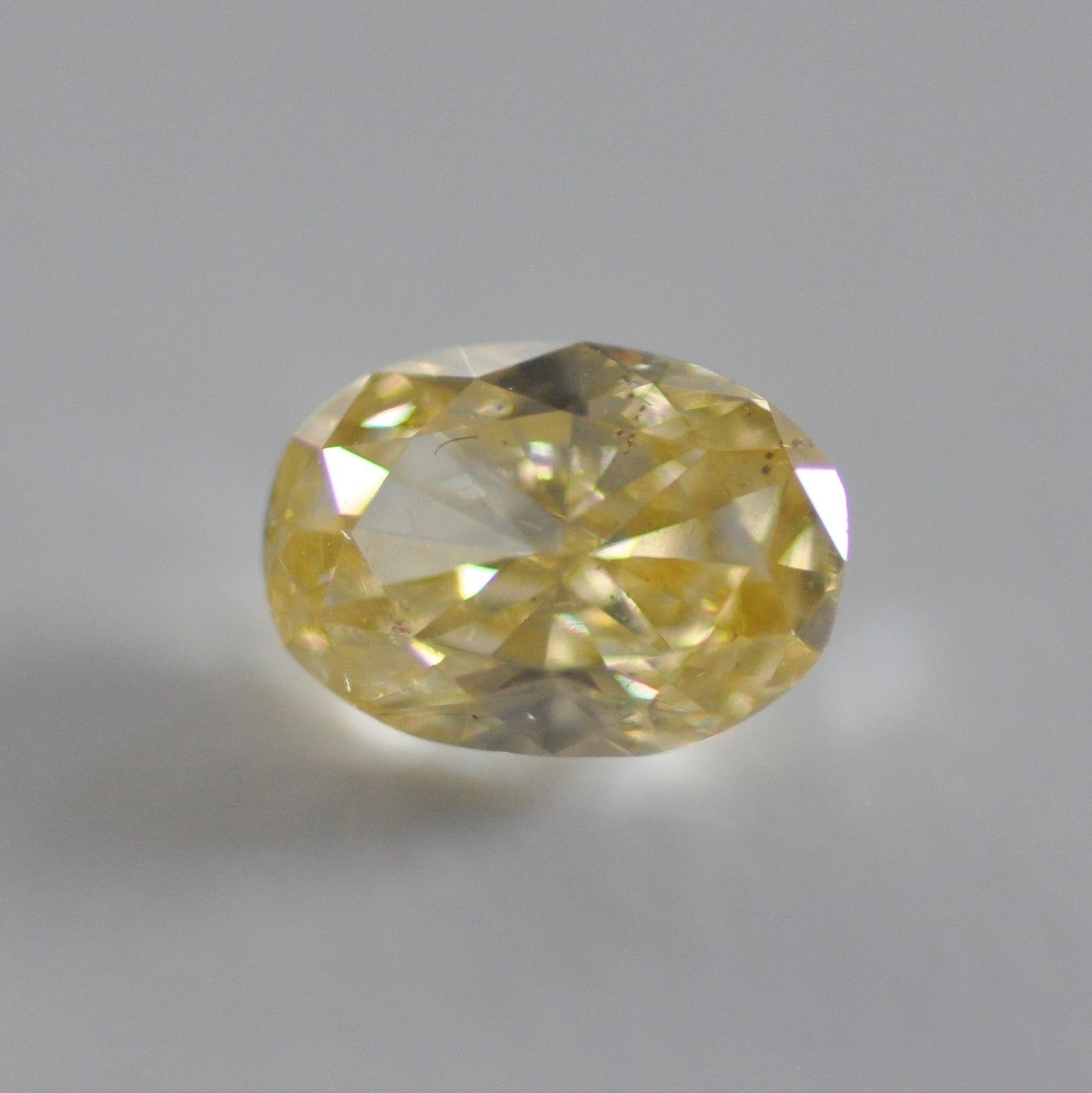 Fancy Yellow 0.66 ct.