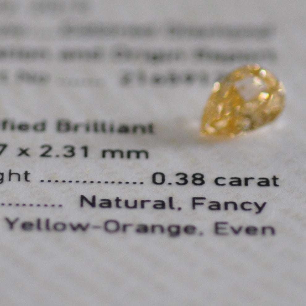 Fancy Yellow- Orange 0.38 ct.