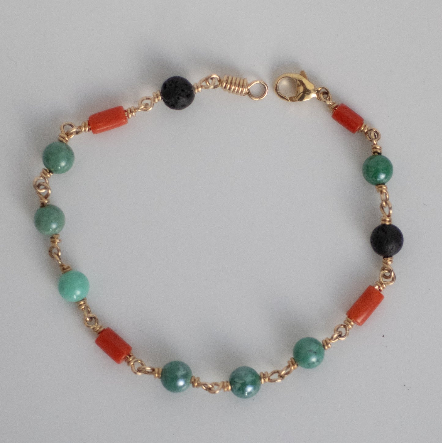 Turquoise, Red coral and Black Lave Bracelet