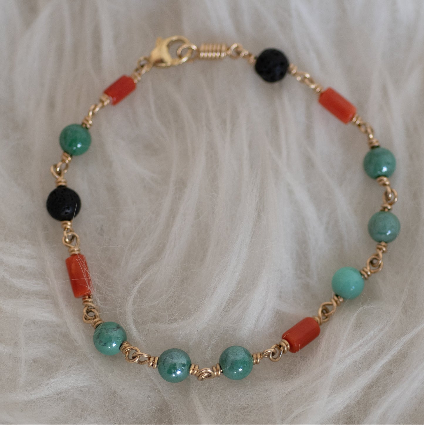 Turquoise, Red coral and Black Lave Bracelet