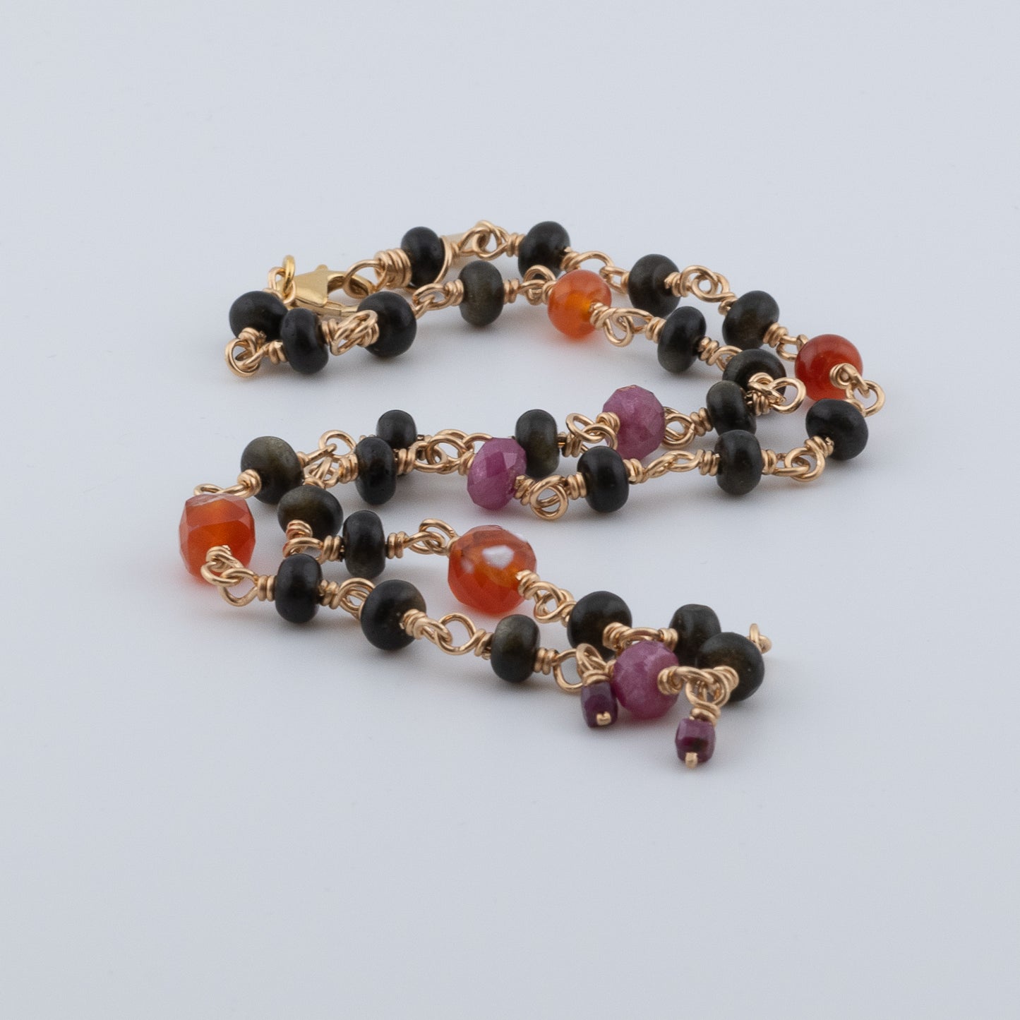 The Ember & Shadow Necklace – Rainbow Obsidian, Fire Agate & Ruby