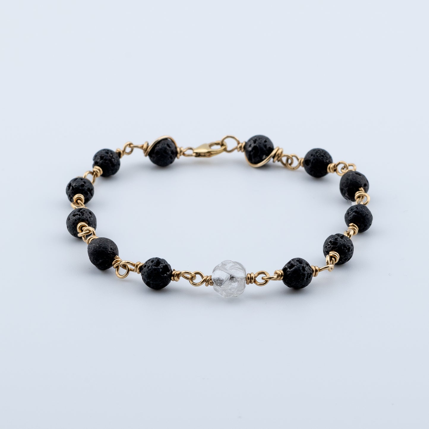 Black Lava and engraved Quartz Bracelet