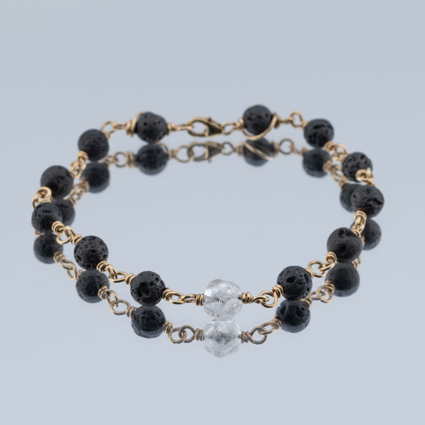 Black Lava and engraved Quartz Bracelet