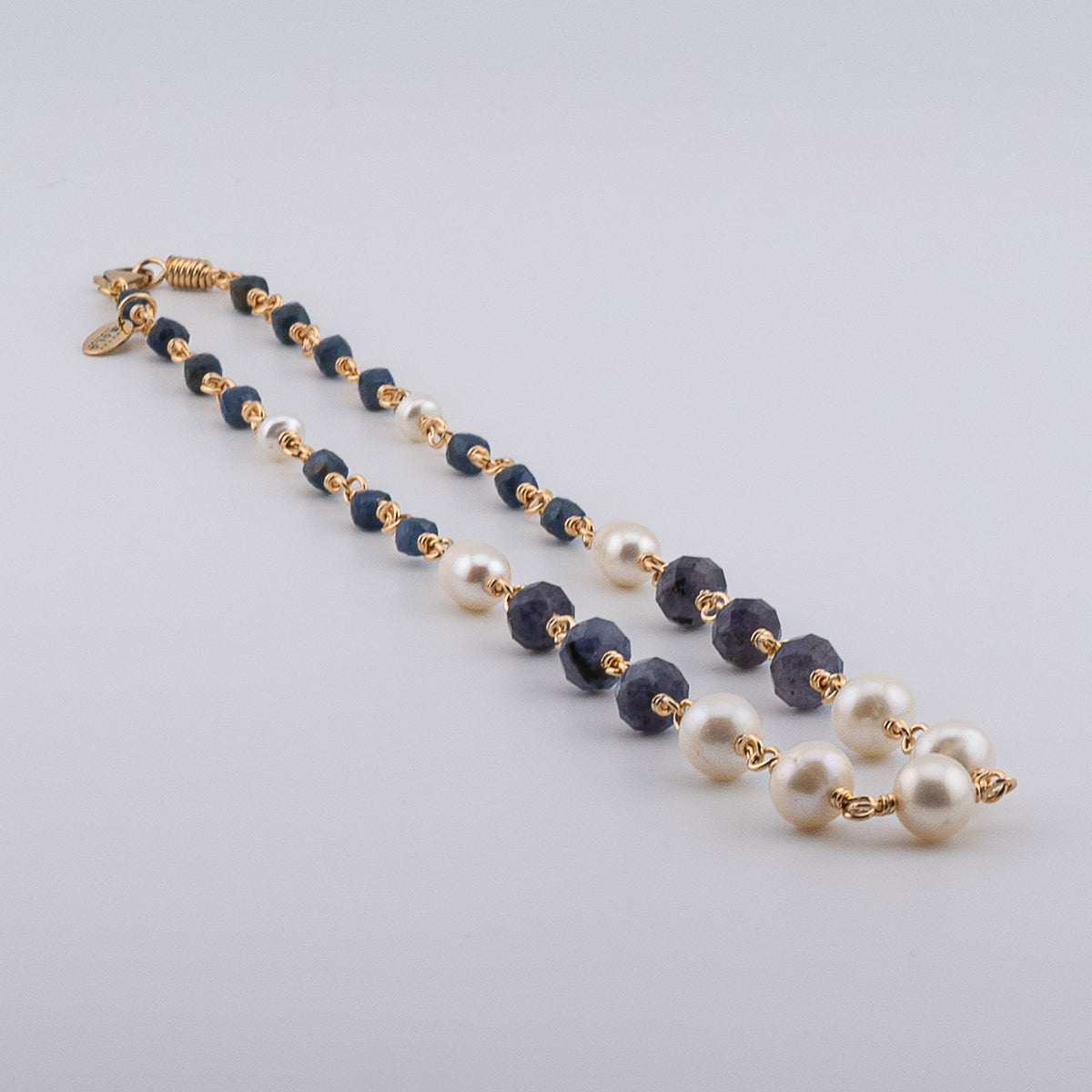 The Sapphire Current Necklace - Blue Sapphire & Freshwater Pearl